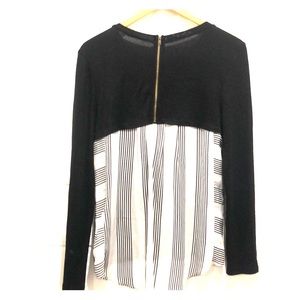 Black knit top with back stripe detail